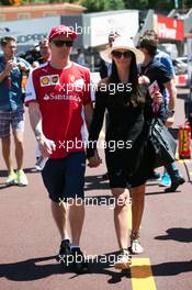 Kimi Raikkonen (FIN) Ferrari with his girlfriend Minttu Virtanen (FIN). 22.05.2015. Formula 1 World Championship, Rd 6, Monaco Grand Prix, Monte Carlo, Monaco, Friday.