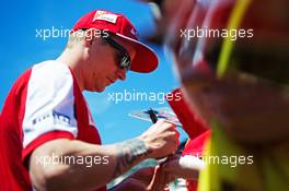 Kimi Raikkonen (FIN) Ferrari signs autographs for the fans. 22.05.2015. Formula 1 World Championship, Rd 6, Monaco Grand Prix, Monte Carlo, Monaco, Friday.