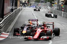 Kimi Raikkonen (FIN) Ferrari SF15-T and Daniel Ricciardo (AUS) Red Bull Racing RB11 battle for position. 24.05.2015. Formula 1 World Championship, Rd 6, Monaco Grand Prix, Monte Carlo, Monaco, Race Day.