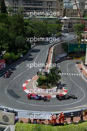 Pastor Maldonado (VEN) Lotus F1 E23 leads Max Verstappen (NLD) Scuderia Toro Rosso STR10. 24.05.2015. Formula 1 World Championship, Rd 6, Monaco Grand Prix, Monte Carlo, Monaco, Race Day.