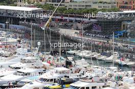 Boats in the scenic Monaco Harbour passed by Daniil Kvyat (RUS) Red Bull Racing RB11. 24.05.2015. Formula 1 World Championship, Rd 6, Monaco Grand Prix, Monte Carlo, Monaco, Race Day.