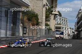 Marcus Ericsson (SWE) Sauber F1 Team and Lewis Hamilton (GBR) Mercedes AMG F1 W06. 24.05.2015. Formula 1 World Championship, Rd 6, Monaco Grand Prix, Monte Carlo, Monaco, Race Day.