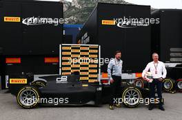 (L to R): Paul Hembery (GBR) Pirelli Motorsport Director and Martin Brundle (GBR) Sky Sports Commentator with the Pirelli 18" (Inch) tyre. 23.05.2015. Formula 1 World Championship, Rd 6, Monaco Grand Prix, Monte Carlo, Monaco, Qualifying Day