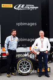 (L to R): Paul Hembery (GBR) Pirelli Motorsport Director and Martin Brundle (GBR) Sky Sports Commentator with the Pirelli 18" (Inch) tyre. 23.05.2015. Formula 1 World Championship, Rd 6, Monaco Grand Prix, Monte Carlo, Monaco, Qualifying Day