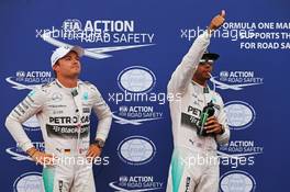 (L to R): second placed Nico Rosberg (GER) Mercedes AMG F1 with team mate and pole sitter Lewis Hamilton (GBR) Mercedes AMG F1 in parc ferme. 23.05.2015. Formula 1 World Championship, Rd 6, Monaco Grand Prix, Monte Carlo, Monaco, Qualifying Day