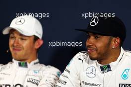 Lewis Hamilton (GBR) Mercedes AMG F1 and team mate Nico Rosberg (GER) Mercedes AMG F1 in the FIA Press Conference. 23.05.2015. Formula 1 World Championship, Rd 6, Monaco Grand Prix, Monte Carlo, Monaco, Qualifying Day