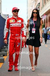 Kimi Raikkonen (FIN) Ferrari with his girlfriend Minttu Virtanen (FIN). 23.05.2015. Formula 1 World Championship, Rd 6, Monaco Grand Prix, Monte Carlo, Monaco, Qualifying Day