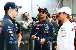 (L to R): Daniil Kvyat (RUS) Red Bull Racing with Daniel Ricciardo (AUS) Red Bull Racing and Nico Rosberg (GER) Mercedes AMG F1 on the drivers parade. 24.05.2015. Formula 1 World Championship, Rd 6, Monaco Grand Prix, Monte Carlo, Monaco, Race Day.