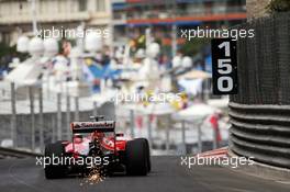 Kimi Raikkonen (FIN) Ferrari SF15-T sends sparks flying. 21.05.2015. Formula 1 World Championship, Rd 6, Monaco Grand Prix, Monte Carlo, Monaco, Practice Day.