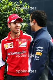 (L to R): Sebastian Vettel (GER) Ferrari with Daniel Ricciardo (AUS) Red Bull Racing. 21.05.2015. Formula 1 World Championship, Rd 6, Monaco Grand Prix, Monte Carlo, Monaco, Practice Day.