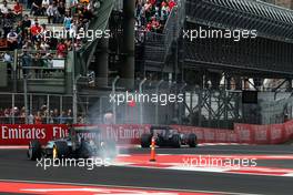 Nico Rosberg (GER) Mercedes AMG F1 W06 with his rear brakes on fire. 30.10.2015. Formula 1 World Championship, Rd 17, Mexican Grand Prix, Mexixo City, Mexico, Practice Day.