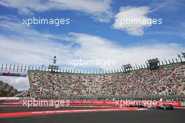 Fernando Alonso (ESP) McLaren MP4-30 leads Lewis Hamilton (GBR) Mercedes AMG F1 W06. 30.10.2015. Formula 1 World Championship, Rd 17, Mexican Grand Prix, Mexixo City, Mexico, Practice Day.
