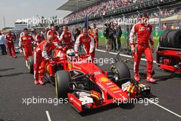Sebastian Vettel (GER) Ferrari SF15-T on the grid. 01.11.2015. Formula 1 World Championship, Rd 17, Mexican Grand Prix, Mexixo City, Mexico, Race Day.