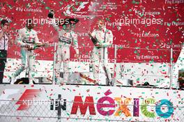 1st place Nico Rosberg (GER) Mercedes AMG F1 W06, 2nd place Lewis Hamilton (GBR) Mercedes AMG F1 W06 and 3rd place Valtteri Bottas (FIN) Williams FW37. 01.11.2015. Formula 1 World Championship, Rd 17, Mexican Grand Prix, Mexixo City, Mexico, Race Day.