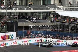 Race winner Nico Rosberg (GER) Mercedes AMG F1 W06 and second placed team mate Lewis Hamilton (GBR) Mercedes AMG F1 W06 celebrate in parc ferme. 01.11.2015. Formula 1 World Championship, Rd 17, Mexican Grand Prix, Mexixo City, Mexico, Race Day.