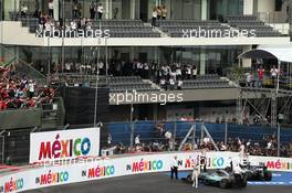 Race winner Nico Rosberg (GER) Mercedes AMG F1 W06 and second placed team mate Lewis Hamilton (GBR) Mercedes AMG F1 W06 celebrate in parc ferme. 01.11.2015. Formula 1 World Championship, Rd 17, Mexican Grand Prix, Mexixo City, Mexico, Race Day.