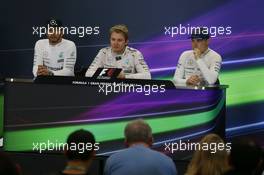 The post race FIA Press Conference (L to R): Lewis Hamilton (GBR) Mercedes AMG F1, second; Nico Rosberg (GER) Mercedes AMG F1, race winner; Valtteri Bottas (FIN) Williams, third. 01.11.2015. Formula 1 World Championship, Rd 17, Mexican Grand Prix, Mexixo City, Mexico, Race Day.