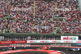 Marcus Ericsson (SWE) Sauber C34 leads Kimi Raikkonen (FIN) Ferrari SF15-T and Felipe Nasr (BRA) Sauber C34. 01.11.2015. Formula 1 World Championship, Rd 17, Mexican Grand Prix, Mexixo City, Mexico, Race Day.