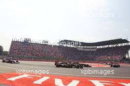 Romain Grosjean (FRA) Lotus F1 E23 and Pastor Maldonado (VEN) Lotus F1 E23. 01.11.2015. Formula 1 World Championship, Rd 17, Mexican Grand Prix, Mexixo City, Mexico, Race Day.