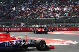Alexander Rossi (USA) Manor Marussia F1 Team leads team mate Will Stevens (GBR) Manor Marussia F1 Team. 01.11.2015. Formula 1 World Championship, Rd 17, Mexican Grand Prix, Mexixo City, Mexico, Race Day.