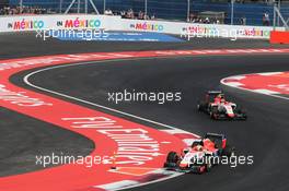 Will Stevens (GBR) Manor Marussia F1 Team leads team mate Alexander Rossi (USA) Manor Marussia F1 Team. 01.11.2015. Formula 1 World Championship, Rd 17, Mexican Grand Prix, Mexixo City, Mexico, Race Day.