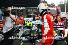 Sebastian Vettel (GER) Ferrari in qualifying parc ferme. 31.10.2015. Formula 1 World Championship, Rd 17, Mexican Grand Prix, Mexixo City, Mexico, Qualifying Day.