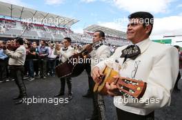 A Mariachi band play outside the Sahara Force India F1 Team garage. 31.10.2015. Formula 1 World Championship, Rd 17, Mexican Grand Prix, Mexixo City, Mexico, Qualifying Day.