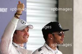 Nico Rosberg (GER), Mercedes AMG F1 Team and Lewis Hamilton (GBR), Mercedes AMG F1 Team  31.10.2015. Formula 1 World Championship, Rd 17, Mexican Grand Prix, Mexixo City, Mexico, Qualifying Day.