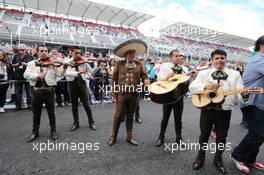 A Mariachi band play outside the Sahara Force India F1 Team pits. 31.10.2015. Formula 1 World Championship, Rd 17, Mexican Grand Prix, Mexixo City, Mexico, Qualifying Day.