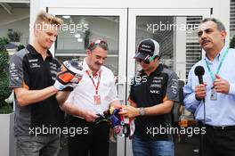 (L to R): Nico Hulkenberg (GER) Sahara Force India F1 with Nigel Mansell (GBR) and Sergio Perez (MEX) Sahara Force India F1 with traditional Mexican wrestling masks. 29.10.2015. Formula 1 World Championship, Rd 17, Mexican Grand Prix, Mexixo City, Mexico, Preparation Day.