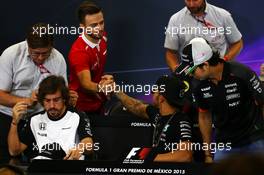 (L to R): Will Stevens (GBR) Manor Marussia F1 Team and Lewis Hamilton (GBR) Mercedes AMG F1 in the FIA Press Conference. 29.10.2015. Formula 1 World Championship, Rd 17, Mexican Grand Prix, Mexixo City, Mexico, Preparation Day.