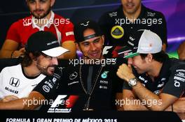 (L to R): Fernando Alonso (ESP) McLaren with Lewis Hamilton (GBR) Mercedes AMG F1 and Sergio Perez (MEX) Sahara Force India F1 in the FIA Press Conference. 29.10.2015. Formula 1 World Championship, Rd 17, Mexican Grand Prix, Mexixo City, Mexico, Preparation Day.