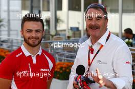 (L to R): Will Stevens (GBR) Manor Marussia F1 Team with Nigel Mansell (GBR). 29.10.2015. Formula 1 World Championship, Rd 17, Mexican Grand Prix, Mexixo City, Mexico, Preparation Day.