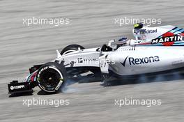 Valtteri Bottas (FIN) Williams FW37 locks up under braking. 27.03.2015. Formula 1 World Championship, Rd 2, Malaysian Grand Prix, Sepang, Malaysia, Friday.