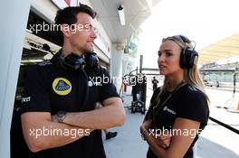 (L to R): Jolyon Palmer (GBR) Lotus F1 Team Test and Reserve Driver with Carmen Jorda (ESP) Lotus F1 Team Development Driver. 27.03.2015. Formula 1 World Championship, Rd 2, Malaysian Grand Prix, Sepang, Malaysia, Friday.
