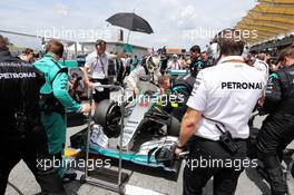 Lewis Hamilton (GBR) Mercedes AMG F1 W06 on the grid. 29.03.2015. Formula 1 World Championship, Rd 2, Malaysian Grand Prix, Sepang, Malaysia, Sunday.