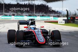 Fernando Alonso (ESP) McLaren MP4-30. 29.03.2015. Formula 1 World Championship, Rd 2, Malaysian Grand Prix, Sepang, Malaysia, Sunday.