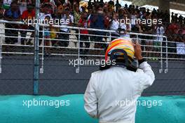 Fernando Alonso (ESP) McLaren on the grid. 29.03.2015. Formula 1 World Championship, Rd 2, Malaysian Grand Prix, Sepang, Malaysia, Sunday.