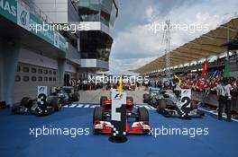 The Ferrari SF15-T of race winner Sebastian Vettel (GER) Ferrari in parc ferme flanked by the Mercedes AMG F1 W06s of Nico Rosberg (GER) Mercedes AMG F1 and Lewis Hamilton (GBR) Mercedes AMG F1. 29.03.2015. Formula 1 World Championship, Rd 2, Malaysian Grand Prix, Sepang, Malaysia, Sunday.