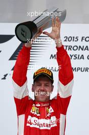 1st place Sebastian Vettel (GER) Ferrari. 29.03.2015. Formula 1 World Championship, Rd 2, Malaysian Grand Prix, Sepang, Malaysia, Sunday.