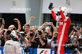 Sebastian Vettel (GER), Scuderia Ferrari and Lewis Hamilton (GBR), Mercedes AMG F1 Team  29.03.2015. Formula 1 World Championship, Rd 2, Malaysian Grand Prix, Sepang, Malaysia, Sunday.
