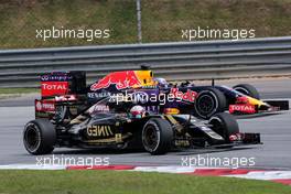 Romain Grosjean (FRA), Lotus F1 Team and Daniel Ricciardo (AUS), Red Bull Racing  29.03.2015. Formula 1 World Championship, Rd 2, Malaysian Grand Prix, Sepang, Malaysia, Sunday.