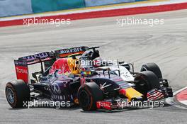 Daniil Kvyat (RUS) Red Bull Racing RB11 and Nico Hulkenberg (GER) Sahara Force India F1 VJM08 collide. 29.03.2015. Formula 1 World Championship, Rd 2, Malaysian Grand Prix, Sepang, Malaysia, Sunday.