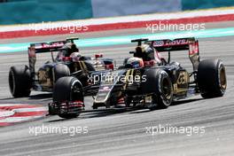 Romain Grosjean (FRA), Lotus F1 Team and Pastor Maldonado (VEN), Lotus F1 Team  29.03.2015. Formula 1 World Championship, Rd 2, Malaysian Grand Prix, Sepang, Malaysia, Sunday.