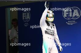 Lewis Hamilton (GBR) Mercedes AMG F1 celebrates his pole position in parc ferme. 28.03.2015. Formula 1 World Championship, Rd 2, Malaysian Grand Prix, Sepang, Malaysia, Saturday.