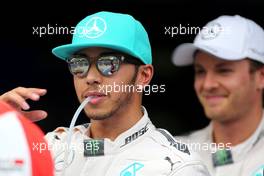 Lewis Hamilton (GBR), Mercedes AMG F1 Team and Nico Rosberg (GER), Mercedes AMG F1 Team  28.03.2015. Formula 1 World Championship, Rd 2, Malaysian Grand Prix, Sepang, Malaysia, Saturday.