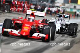 Valtteri Bottas (FIN) Williams FW37 behind Kimi Raikkonen (FIN) Ferrari SF15-T. 28.03.2015. Formula 1 World Championship, Rd 2, Malaysian Grand Prix, Sepang, Malaysia, Saturday.