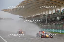 Daniel Ricciardo (AUS) Red Bull Racing RB11 leads team mate Daniil Kvyat (RUS) Red Bull Racing RB11. 28.03.2015. Formula 1 World Championship, Rd 2, Malaysian Grand Prix, Sepang, Malaysia, Saturday.