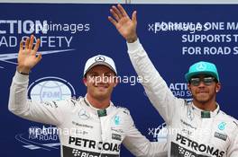 Nico Rosberg (GER) Mercedes AMG F1 W06 and Lewis Hamilton (GBR) Mercedes AMG F1. 28.03.2015. Formula 1 World Championship, Rd 2, Malaysian Grand Prix, Sepang, Malaysia, Saturday.