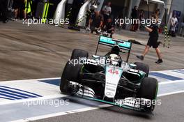 Lewis Hamilton (GBR) Mercedes AMG F1 W06 leaves the pits. 28.03.2015. Formula 1 World Championship, Rd 2, Malaysian Grand Prix, Sepang, Malaysia, Saturday.